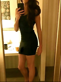 Elegant looking tart is posing at home